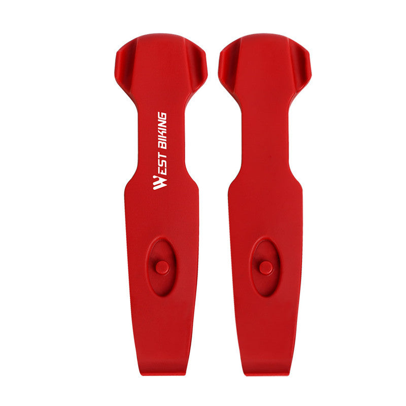 Two red bicycle tyre levers with 'West Biking' branding on a white background