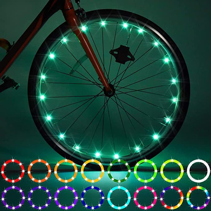 Bicycle wheel with LED lights on a dark background