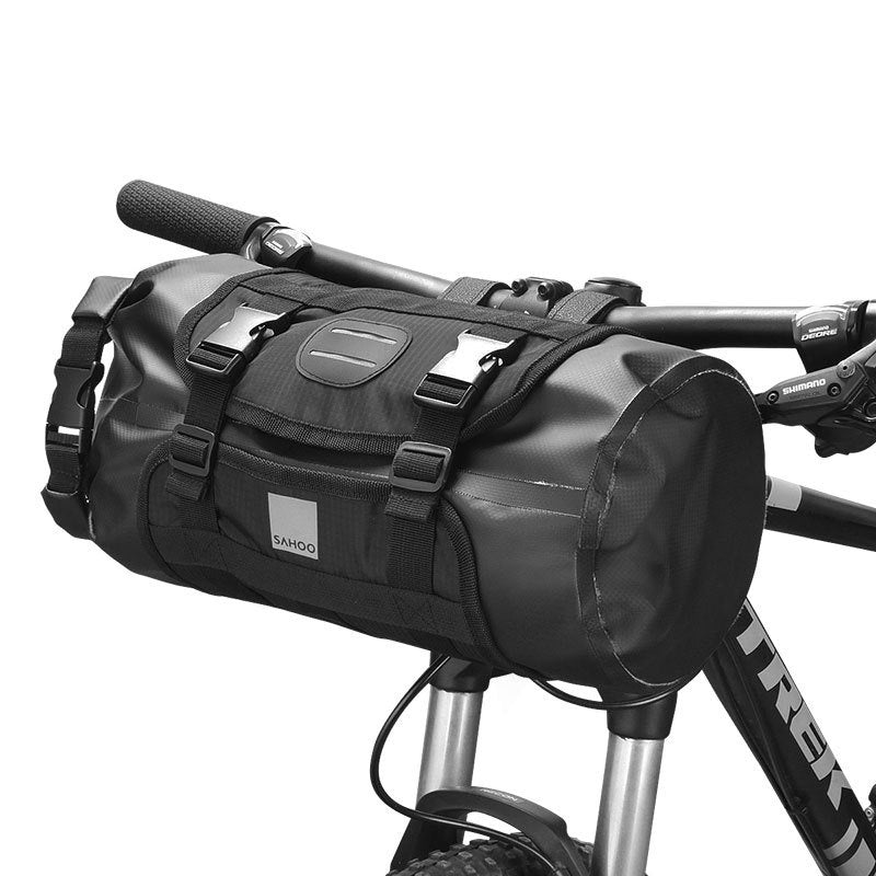 Black bicycle handlebar bag attached to a Trek bike frame on a white background
