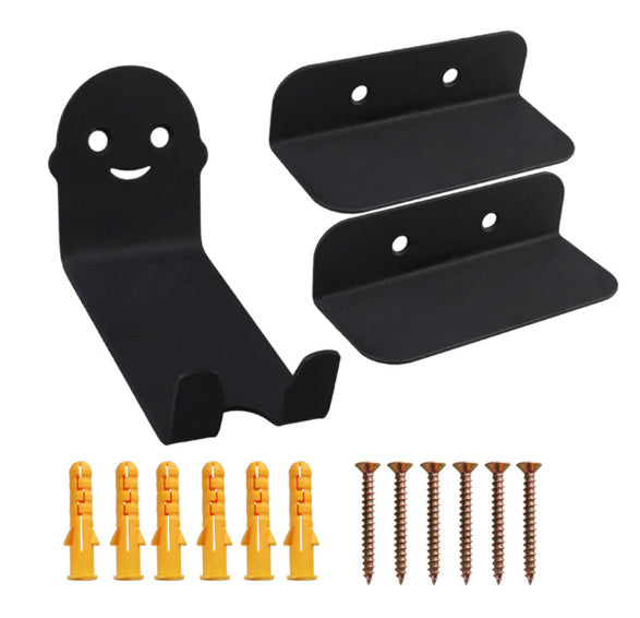 Set of black metal bicycle storage hooks and brackets with corresponding screws and rawl plugs on a white background