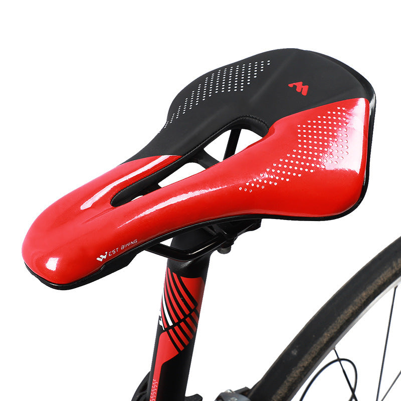 Red and black road bicycle saddle on a white background