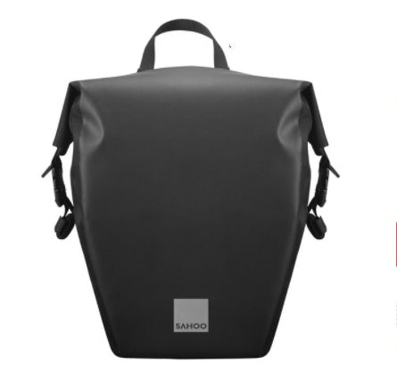 Black bicycle pannier with a visible brand logo on a white background