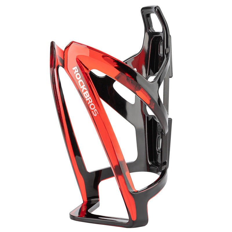 Red and black bicycle bottle cage with 'RockBros' branding on a white background