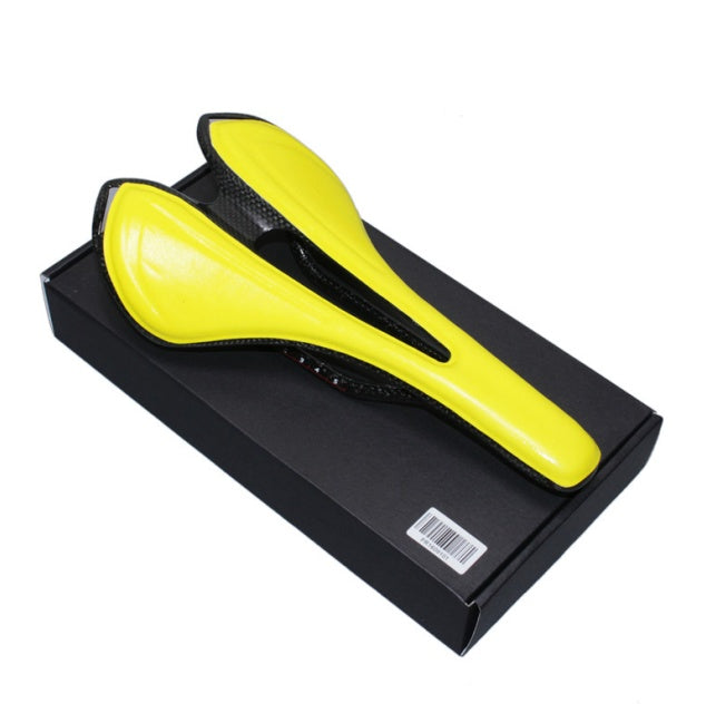 Yellow carbon fibre bicycle seat on a black box with a white background