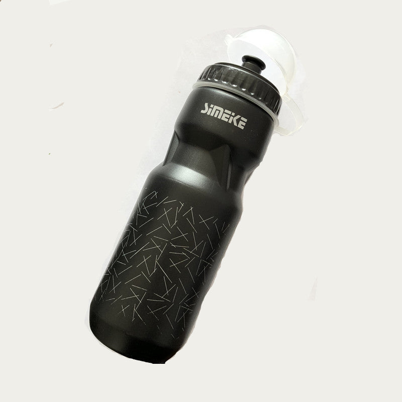 Black bicycle water bottle with black cap on a light gray background
