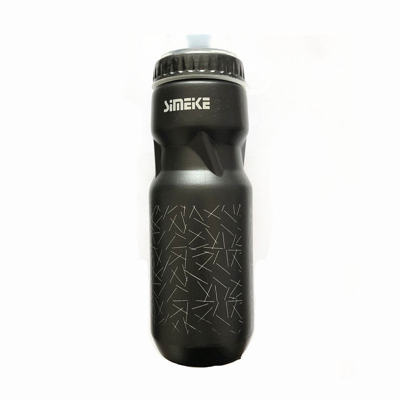 Black bicycle water bottle with black cap on a light gray background