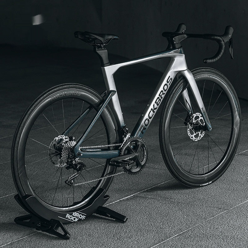 Bicycle on a stand with a dark background
