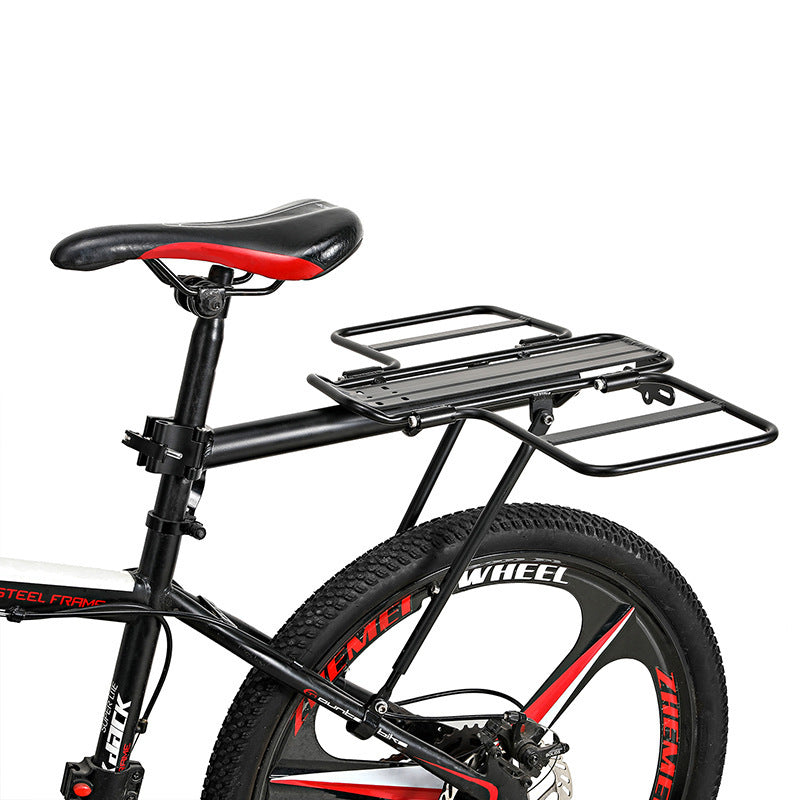 Black bicycle with a rear rack on a white background