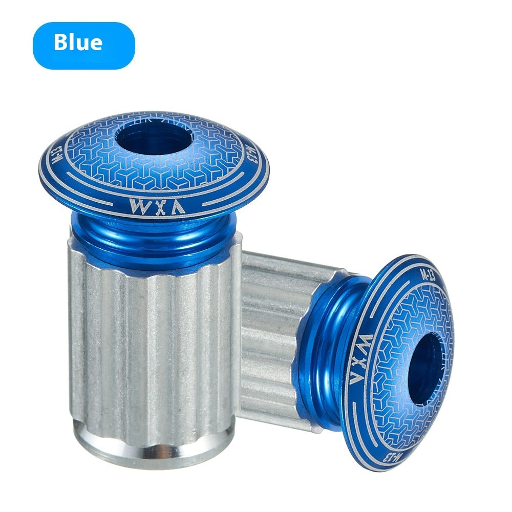 Blue and silver aluminium handlebar plugss with 'WXA' branding on a white background