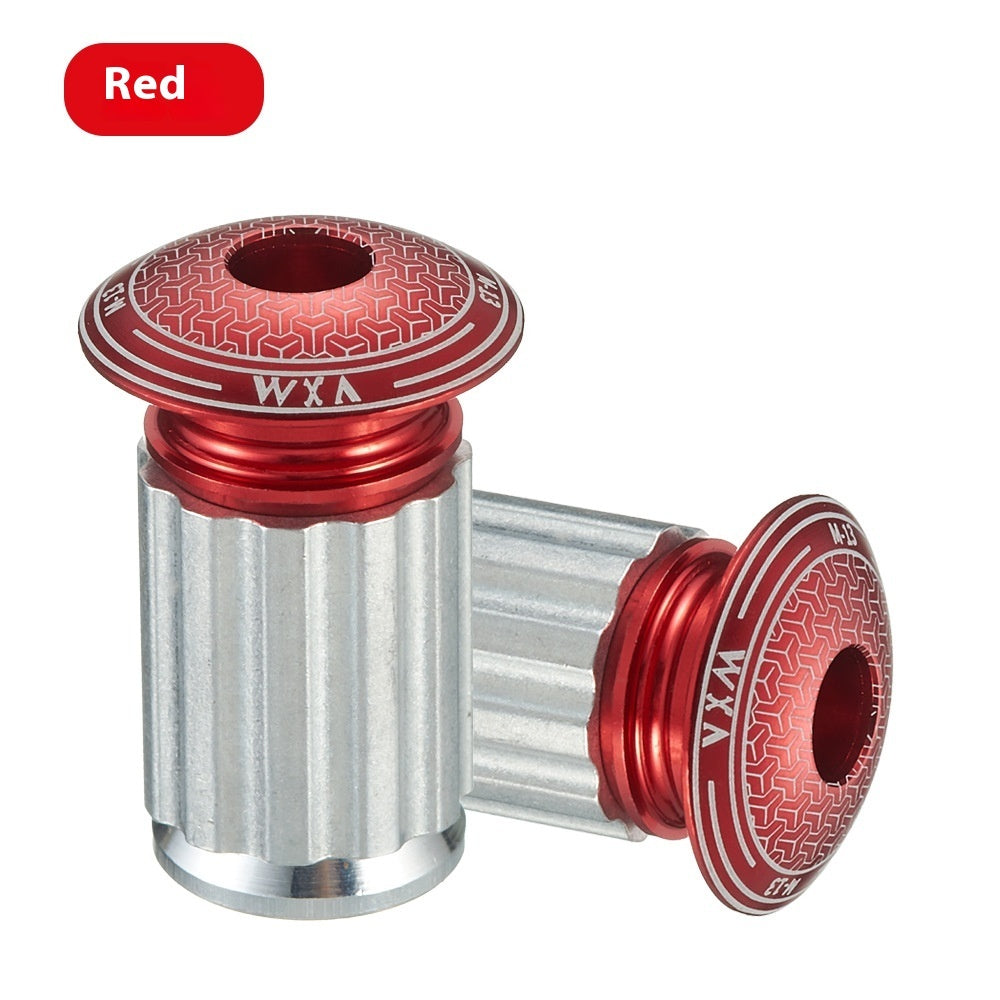 Red and silver aluminium alloy handlebar plugs with 'WXA' branding on a white background