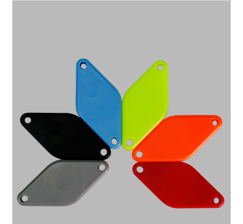 Set of five colorful plastic Bicycle Airtag Tracker Protective Mounts on a gray background