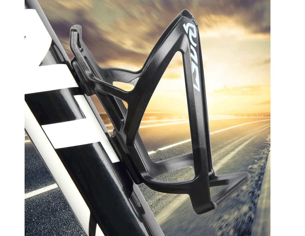 Bicycle water bottle holder with brand logo against a scenic road background