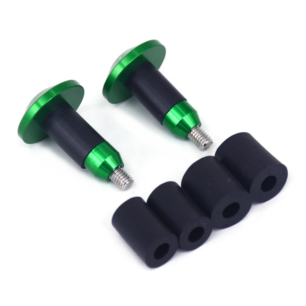 Two green and black aluminium Bicycle Handlebar Plugs with four black rubber sleeves on a white background