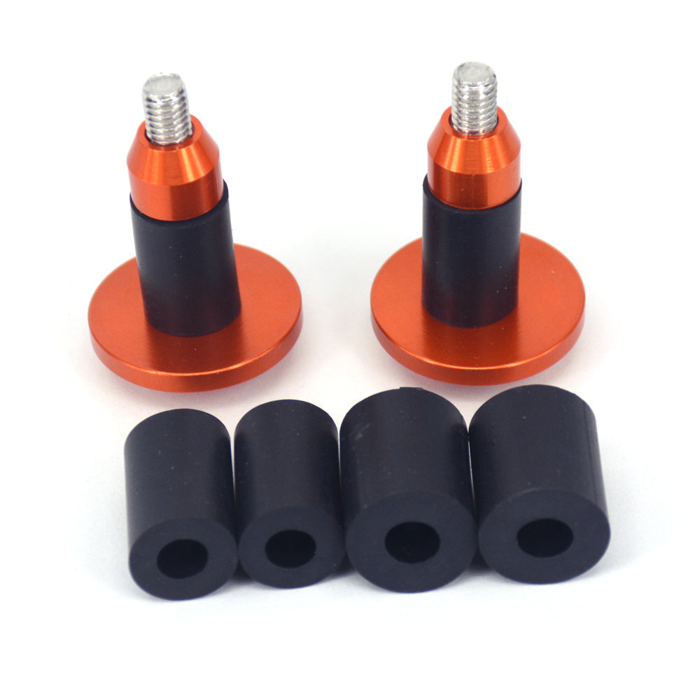Two orange aluminium Bicycle Handlebar Plugs with black rubber bushings on a white background