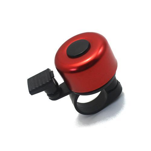 Red bicycle bell with black mounting clip on a white background