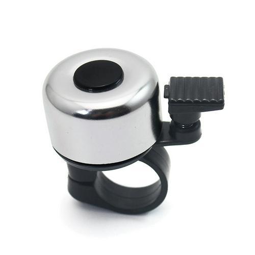 Chrome bicycle bell with black center and mounting bracket on a white background