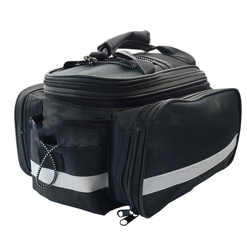 Black bicycle saddle bag with reflective strips mounted on a bicycle rack