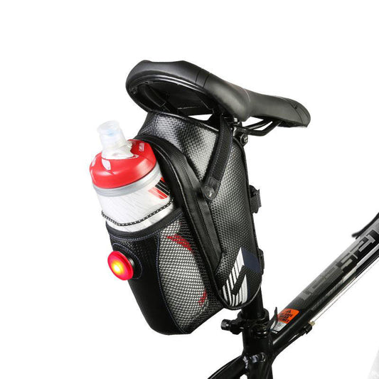 Bicycle saddle bag with water bottle holder and light on a white background