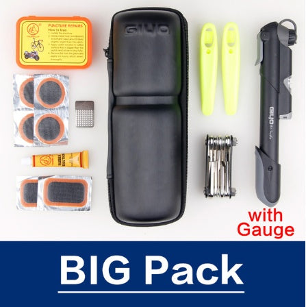 Black bicycle tool bag with a selection of bike repair tools including a puncture repair kit, pump, and tools on a white background.