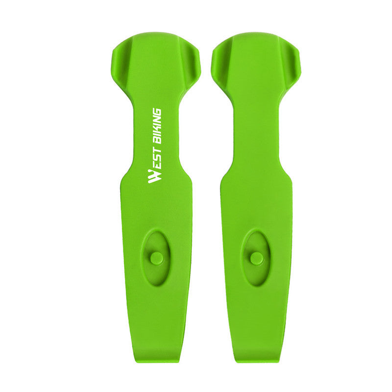 Two green bicyce tyre levers with 'West Biking' branding on a white background.