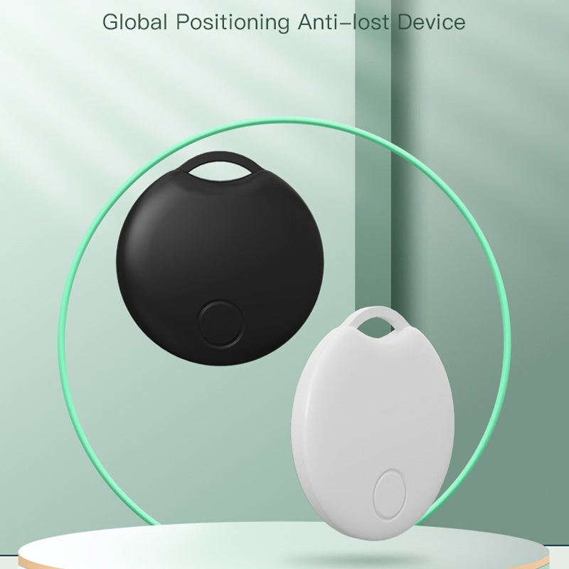 Two global positioning Bluetooth GPS Tracker devices on a light green background