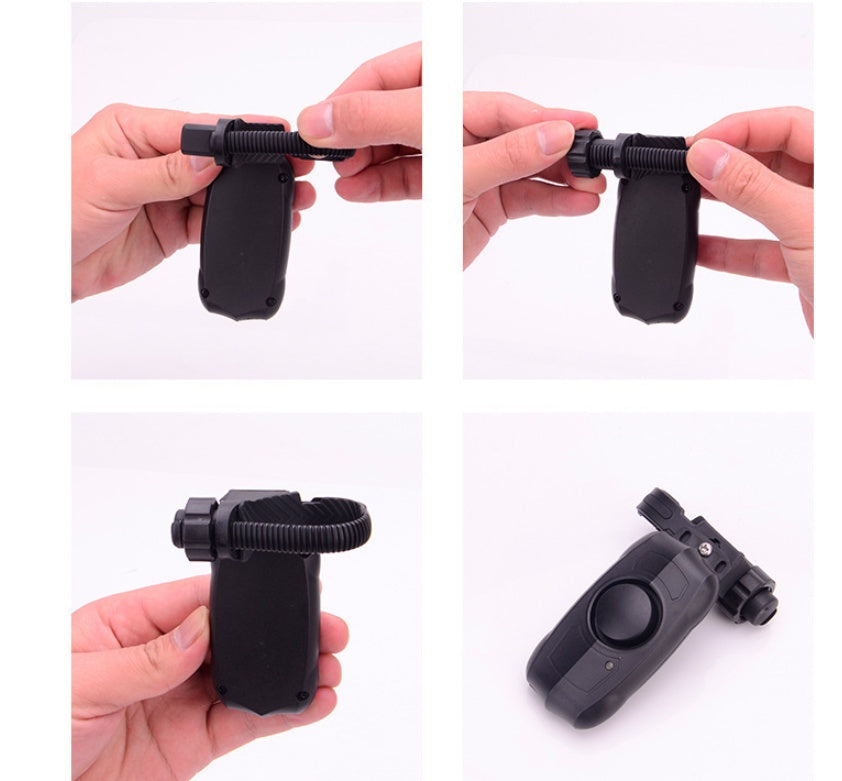 Black remote bicycle alarm being held and shown from different angles on a white background