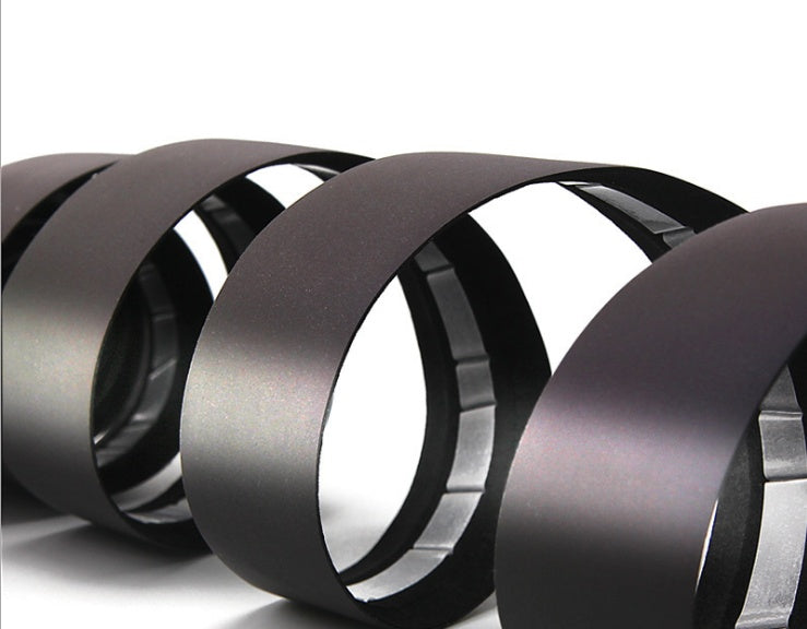 Close-up of black CX-85 Reflective Bicycle Handlebar Tape on a white background