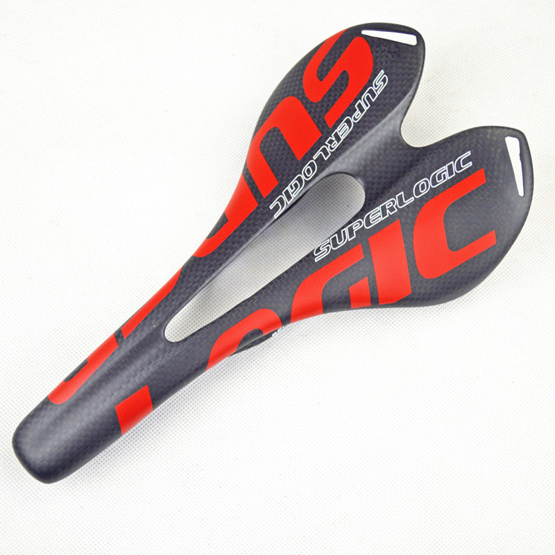 Grey and red carbon fibre bicycle saddle with 'Superlogic' branding on a white background