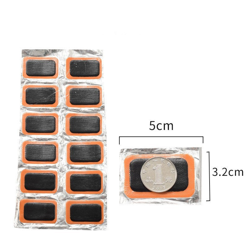 Packaging of small adhesive bicycle tube repair patches with a coin for size reference on a white background