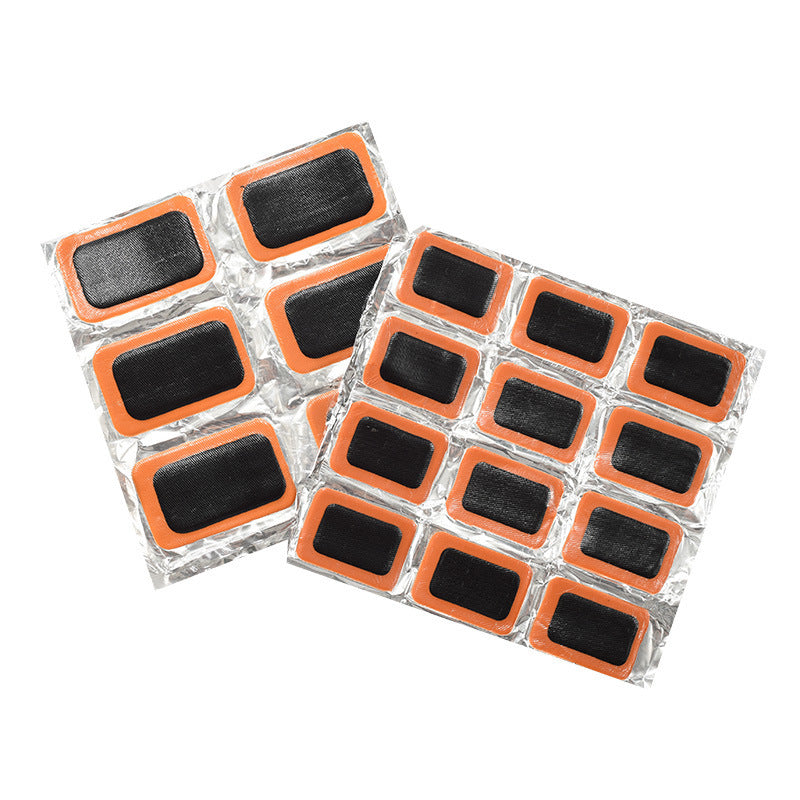 Packaged black Bicycle Tyre Repair Patches with orange borders on a white background