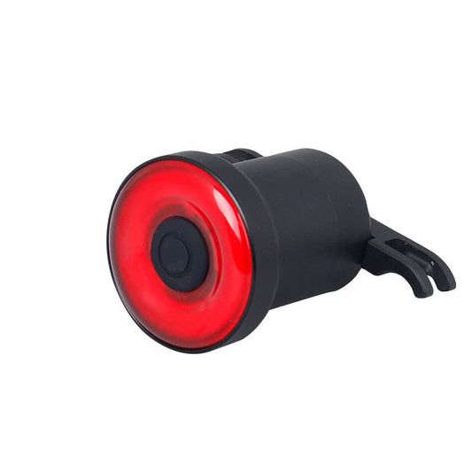 Red bike light with black casing on a white background