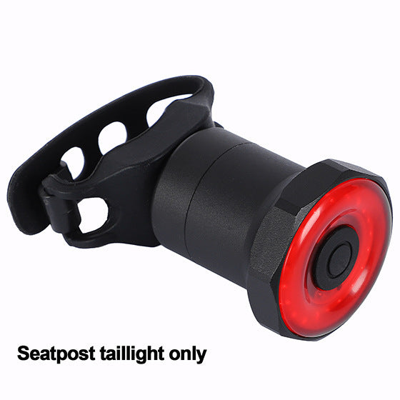Black and red seatpost taillight on a white background