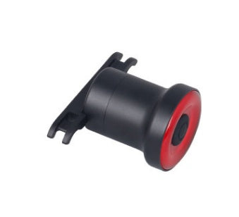 Black and red rear bicycle light on a white background