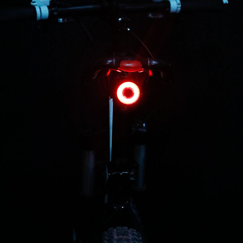 Red light on a bicycle in the dark