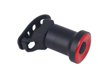 Black and red ENFITNIX Xlite100 Rear Bicycle Light with a clip on a white background