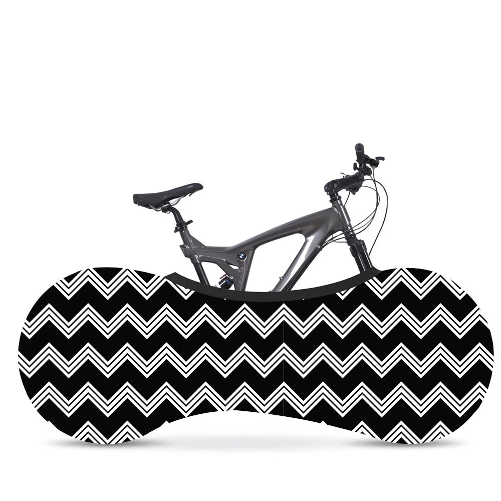 Bicycle in a black and white zigzag patterned Elasticated Bicycle Dust Cover against a white background