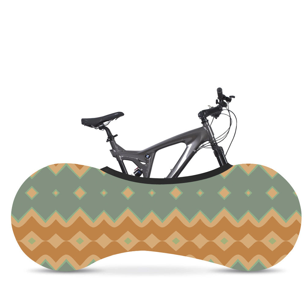 Bicycle in a patterned Elasticated Bicycle Dust Cover against a white background