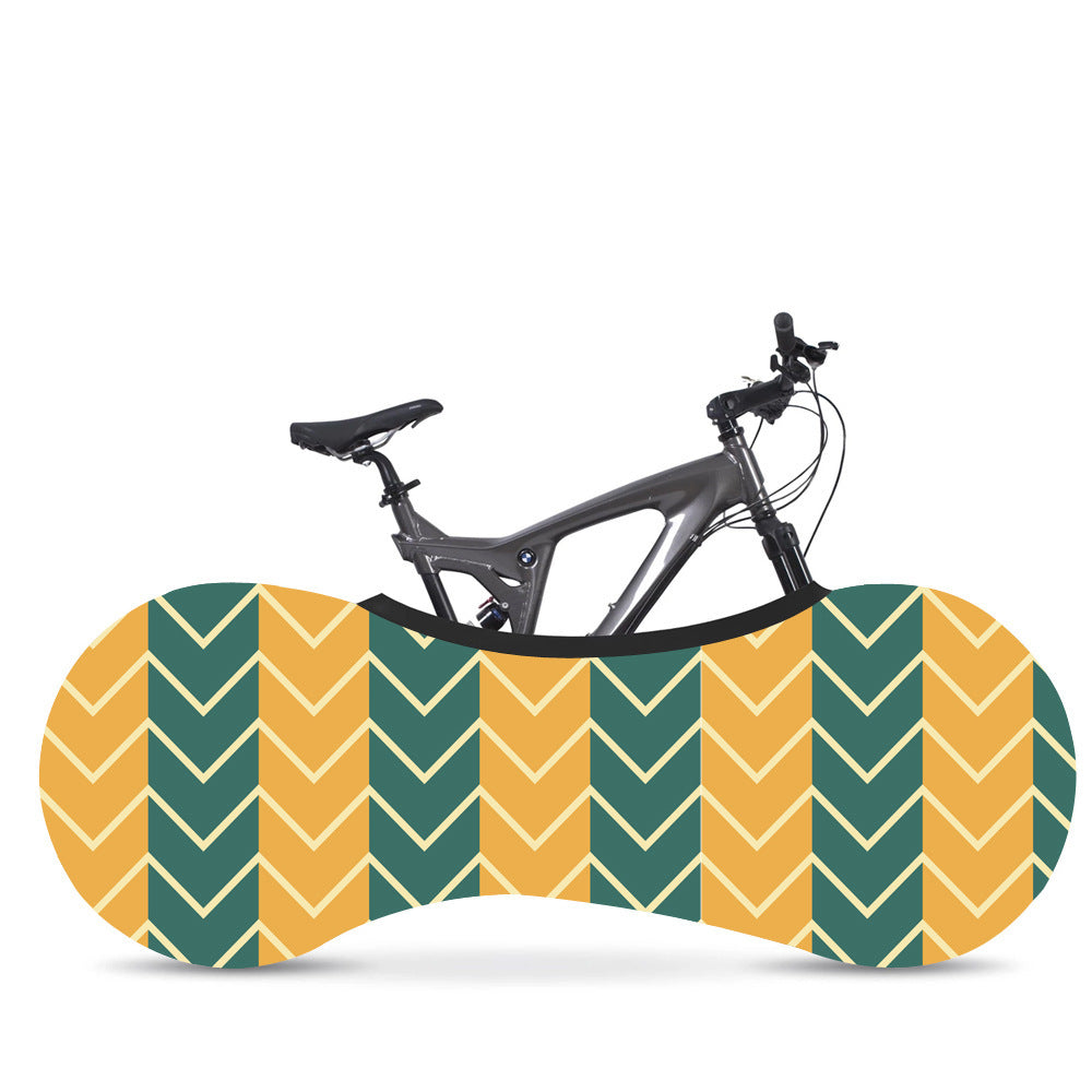 Bicycle in a colorful patterned Elasticated Bicycle Dust Cover with a white background