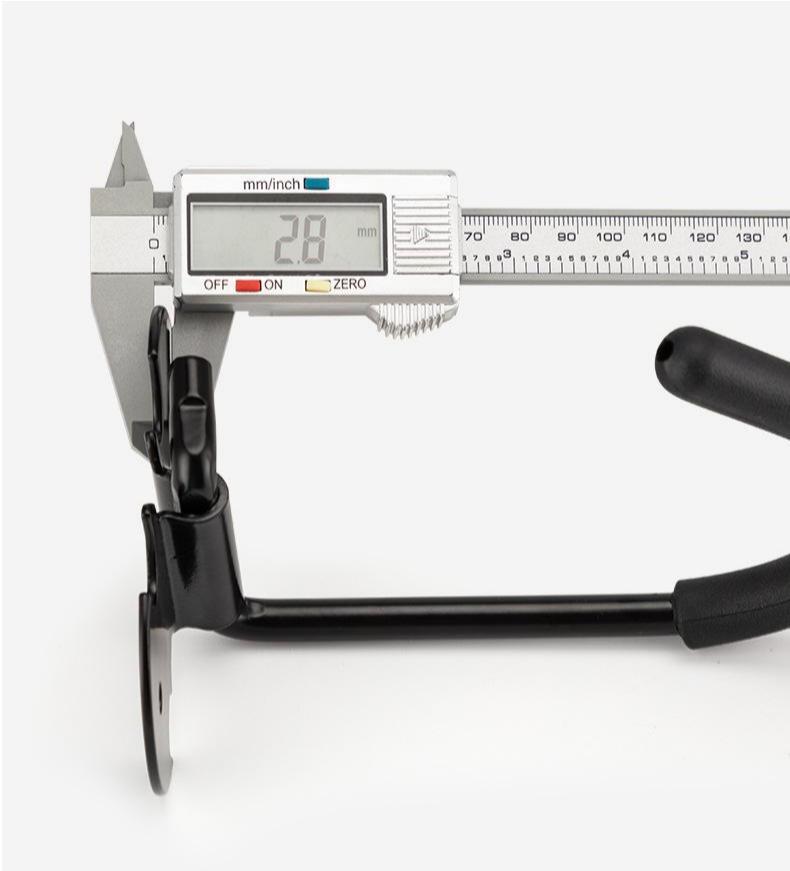 Digital caliper measuring a black metal folding bicycle storage hook on a white background