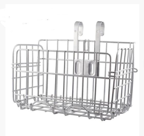 Metal wire basket with hooks on a white background