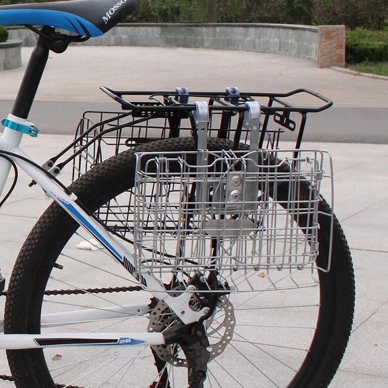 To rear-mounted bicycle baskets on a bicycle rack.