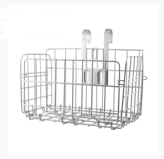 Metal wire basket with hooks on a white background