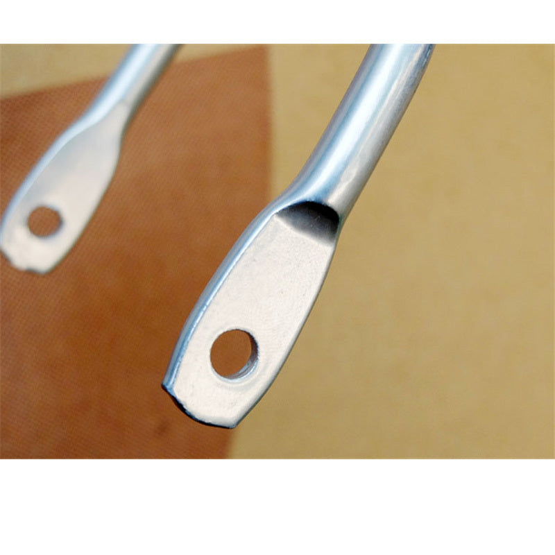 Attachment holes on the struts of a silver metal bicycle rack