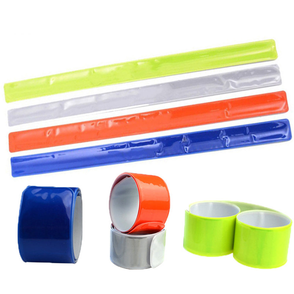 Set of colorful reflective bicycle leg bands on a white background