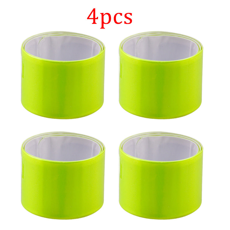 Four reflective cycling leg bands on a white background
