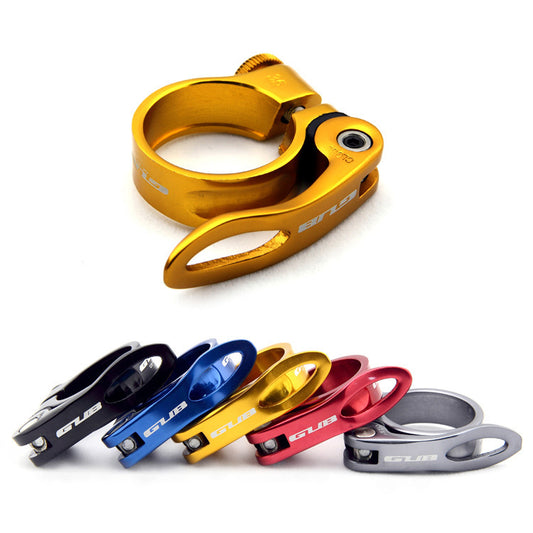 Set of five black, gold, blue, red, and silver bike seat clamps on a white background