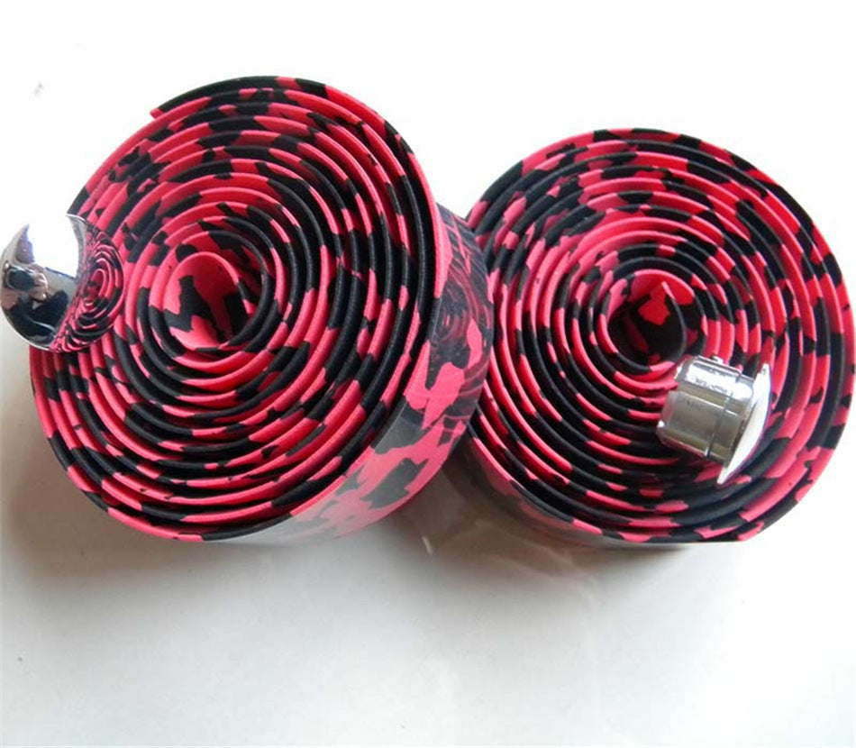 Two rolls of pink and black Lightweight, Non-slip Bicycle Handlebar Tape on a white background
