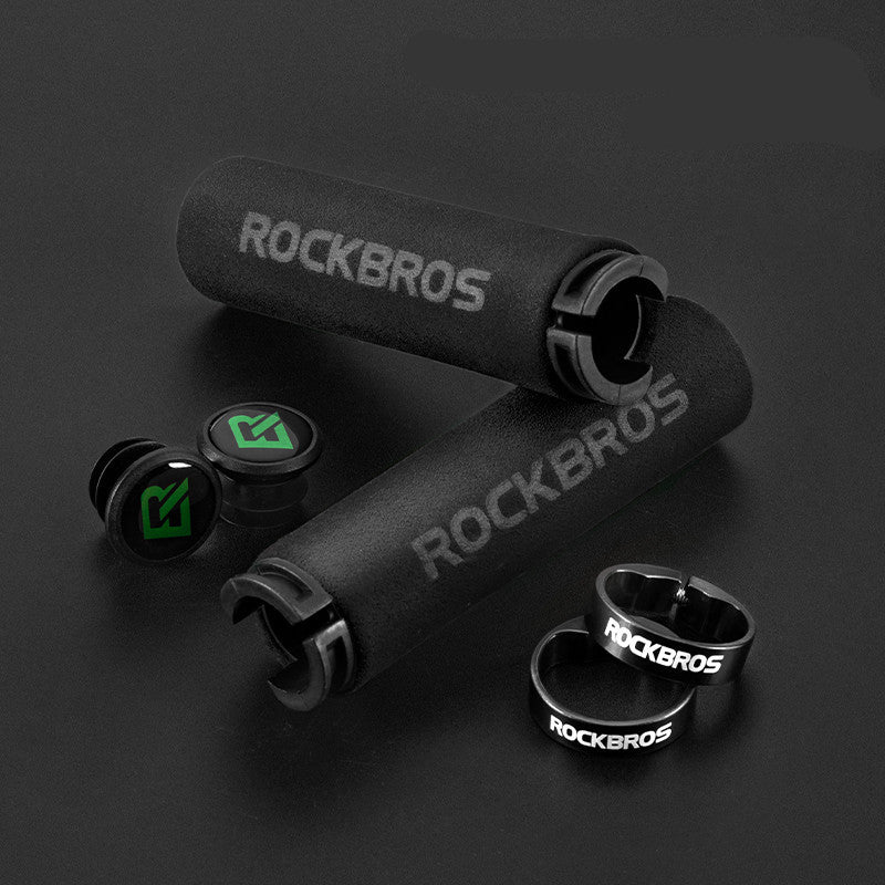 Black bicycle handlebar grips with 'ROCKBROS' branding on a dark background