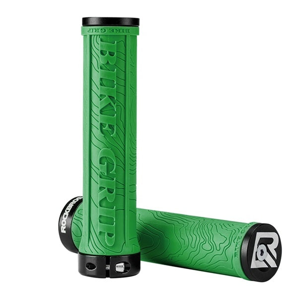 Green bike handlebar grips with black ends on a white background