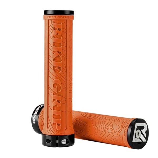 Orange bike handlebar grips with black ends on a white background